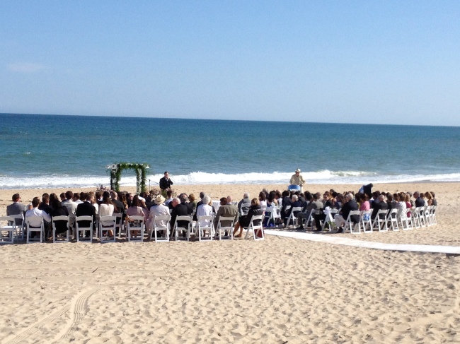 New York wedding planner looks over the beach where the wedding ...